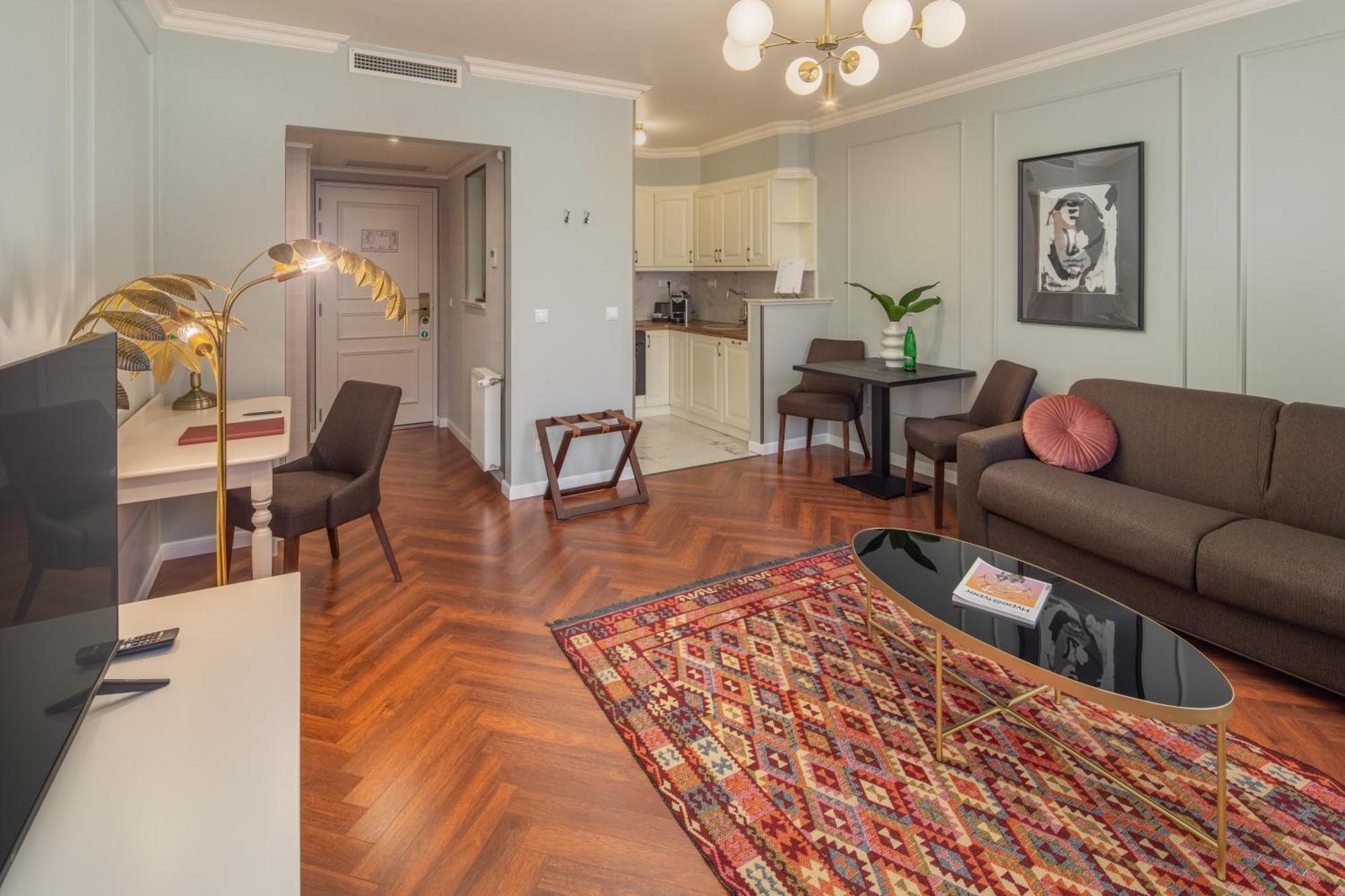فندق وسكن كوينز كورت بودابست الغرفة الصورة A typical apartment at the Residence
