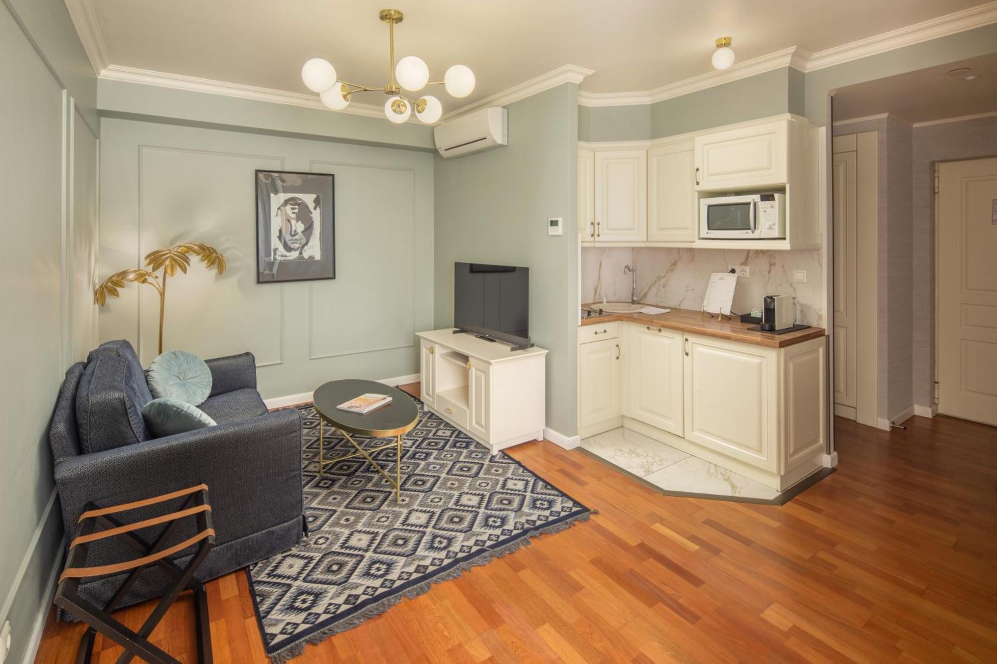 فندق وسكن كوينز كورت بودابست الغرفة الصورة A typical studio apartment